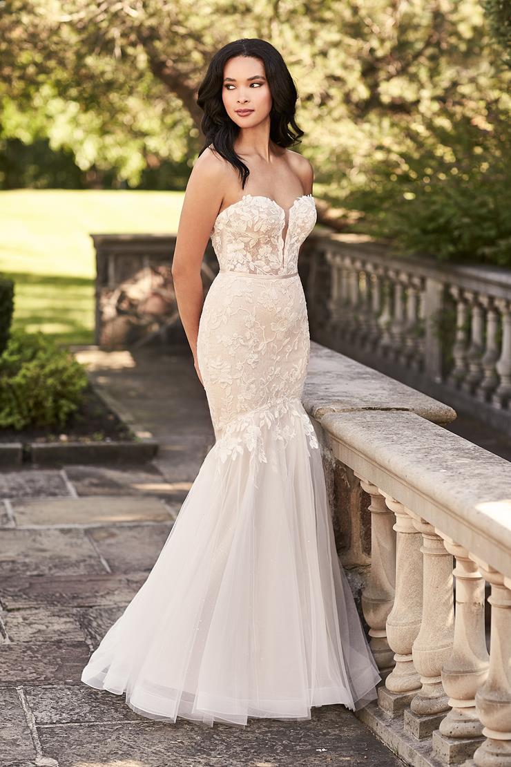 Model wearing a Paloma Blanca gown