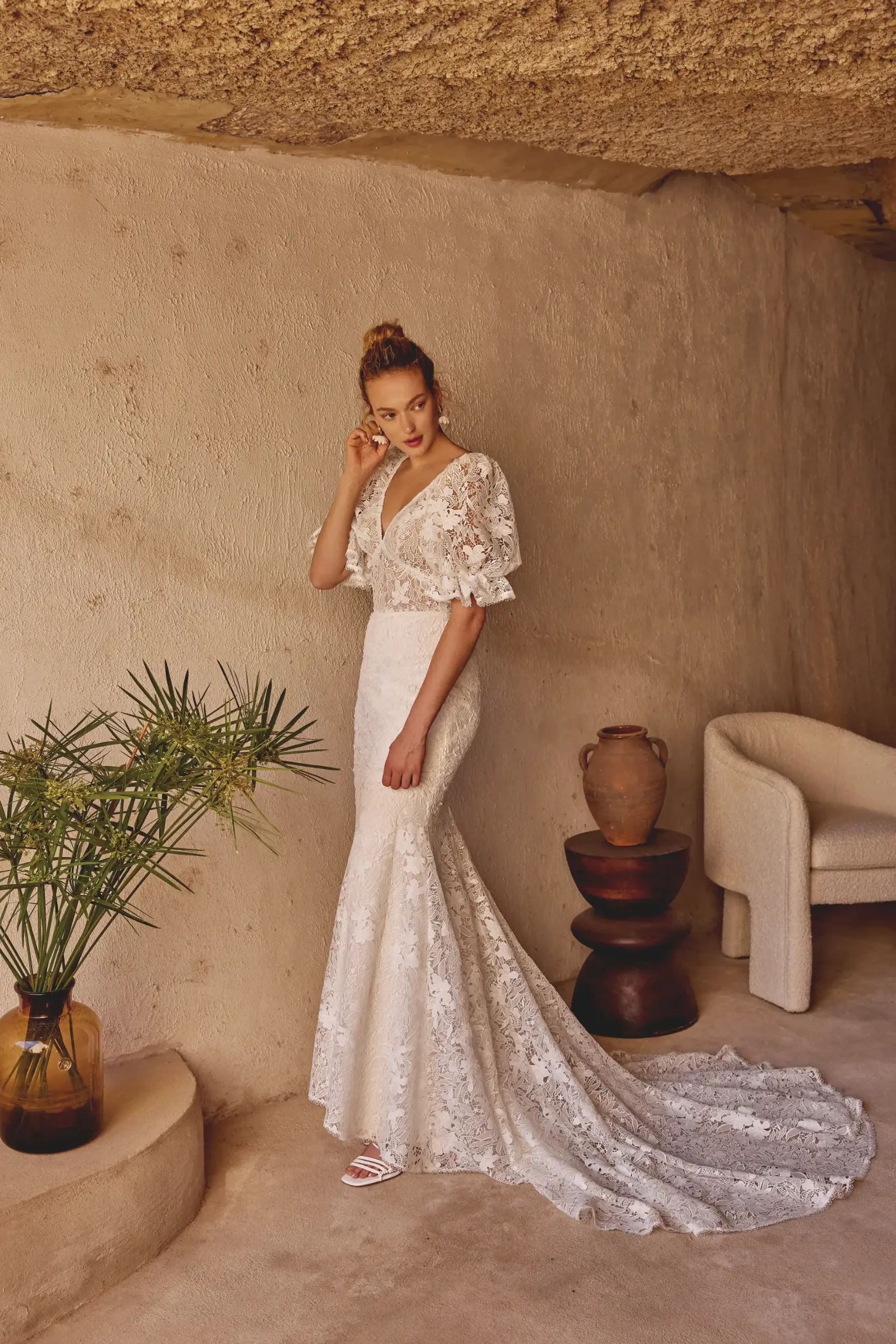 Model wearing a Lillian West gown